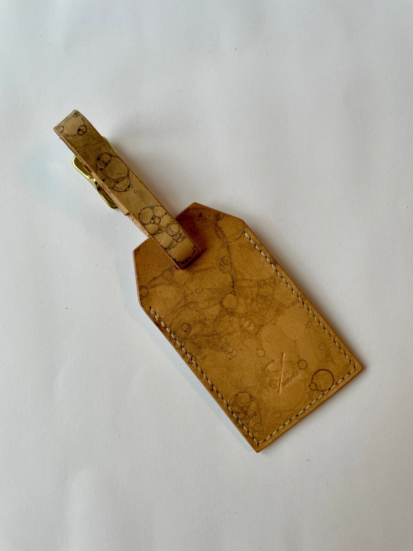 Leather bag tag bubbles