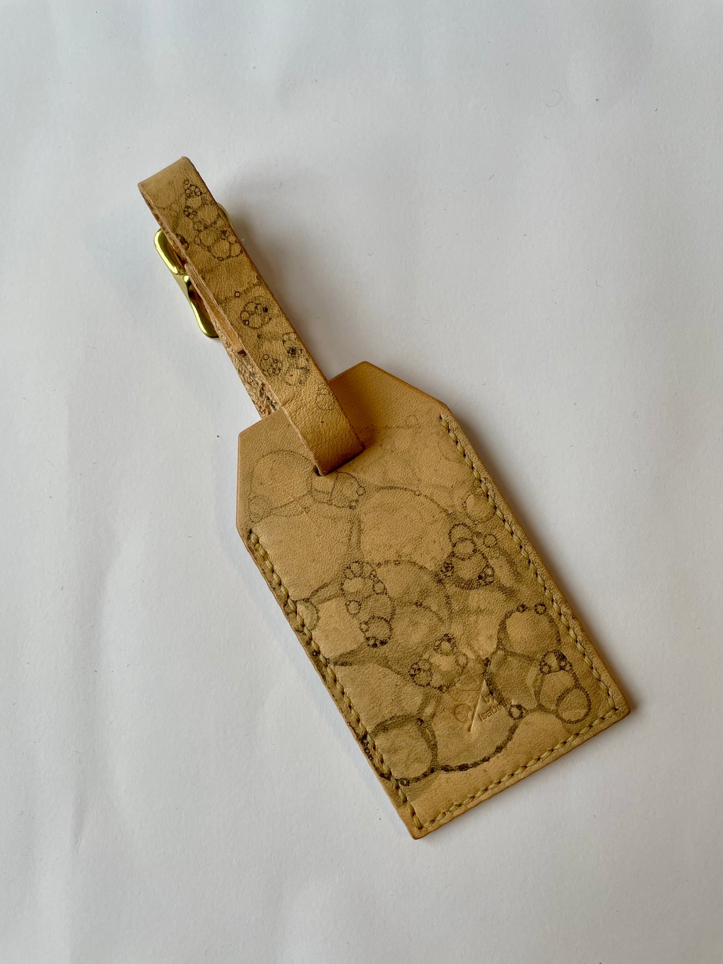 Leather bag tag bubbles