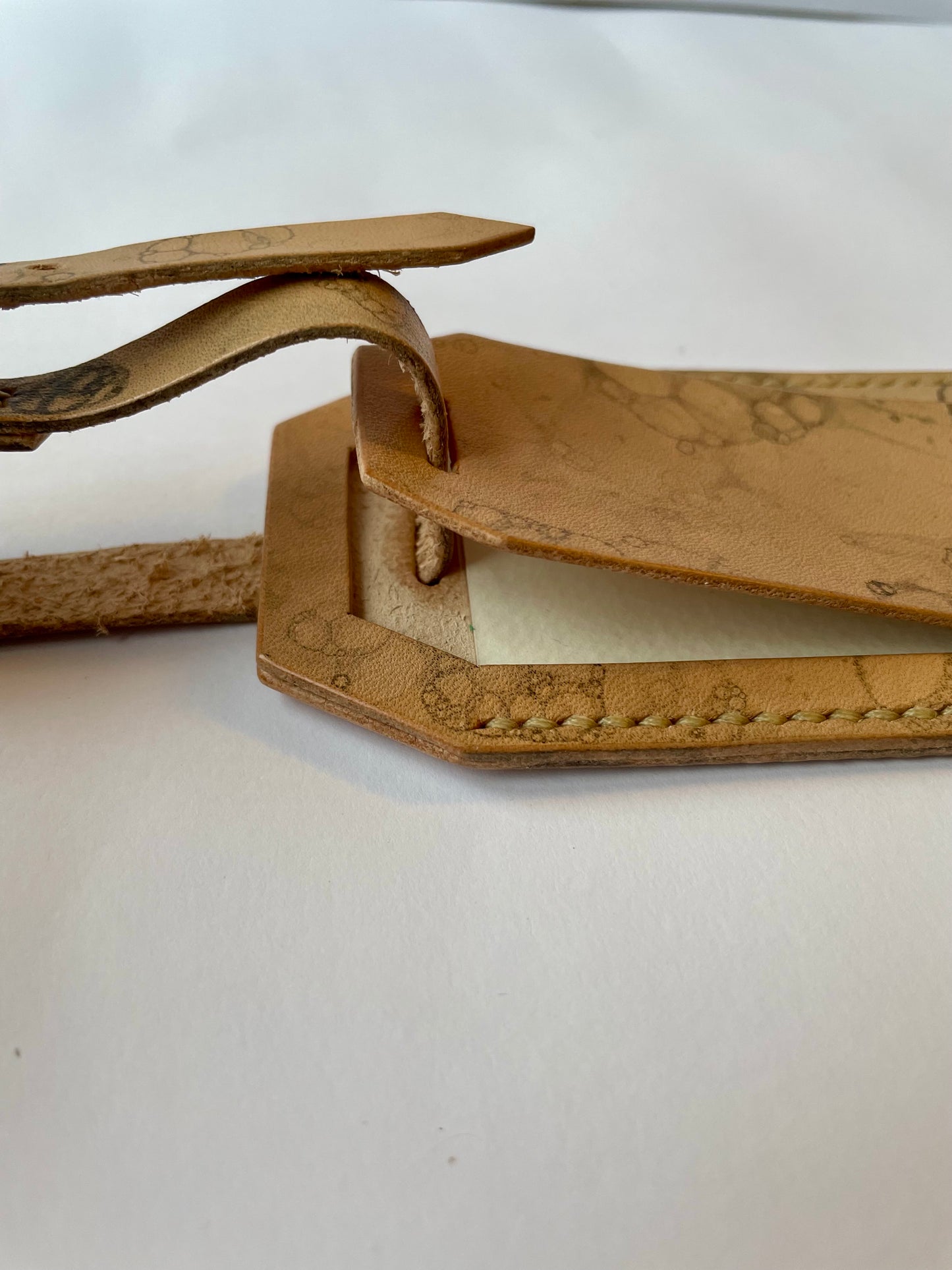 Leather bag tag bubbles